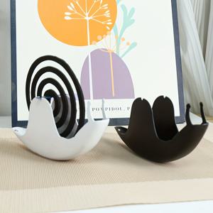 가정용 철선 플레이트를 사용하는 창의적인 달팽이 모양의 코일 홀더, 집에서 사용하기에 적합합니다.