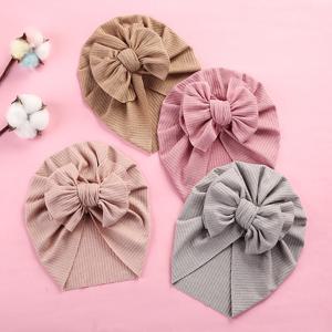 1pc 솔리드 컬러 아기 늑골이있는 Turban 모자 Bowknot 아기 여아 소년 머리는 아기 아이 보닛을 포장한다 Beanies 신생아 인도 Turban 모자