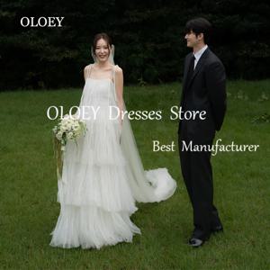 OLOEY 2025 새로운 라인 웨딩 드레스 한국 Photoshoot 맞춤형 계층화 된 Tulle 신부 가운 스파게티 스트랩 순수 아이보리 민소매