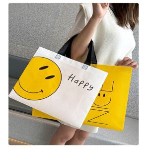 해피 부직포 쇼핑백 노랑 스마일 포장 봉투  50장세트 의류매장쇼핑백 단체선물 투명쇼핑백