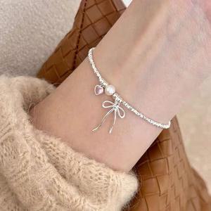 [홀리지]그이비 드롭 리본 팬던트 큐빅 진주 팔찌 (925silver)