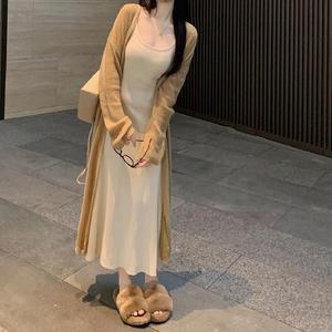 [BZI52K0M_51IB]여성 가을 바닷가 휴양지 시스루 롱 로브