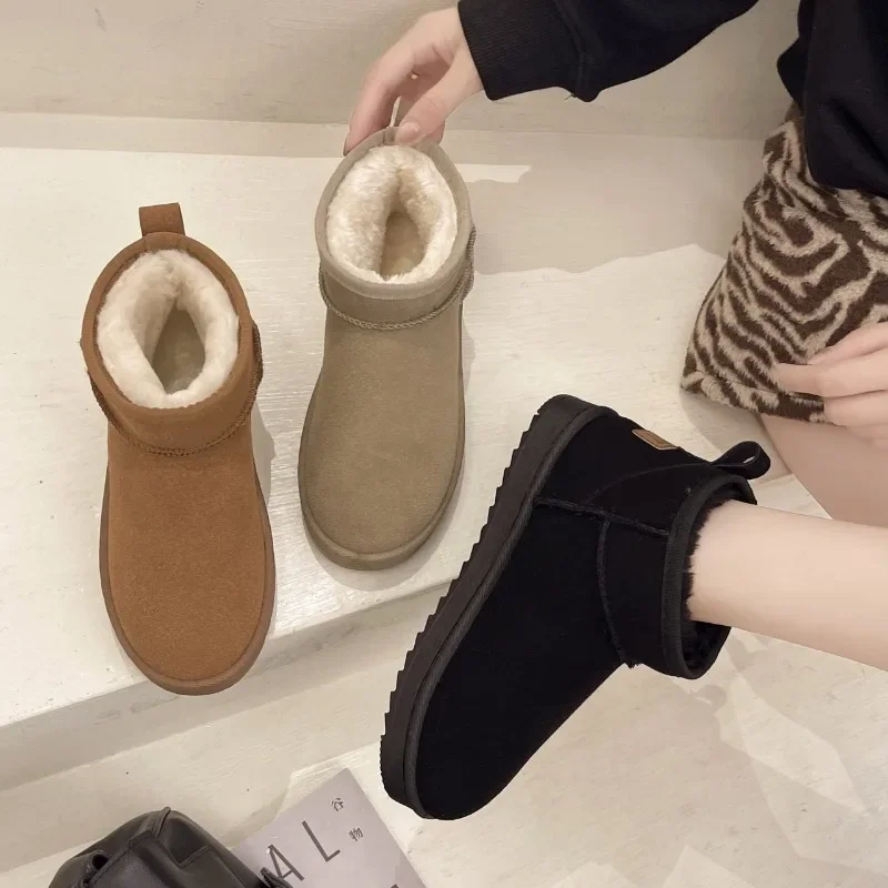 새로운 스노우 부츠 스타일 짧은 미니 겨울 양피 부츠 여성 방수 천연 양모 발목 부츠 모피 줄 지어 발목 따뜻한 플랫 신발