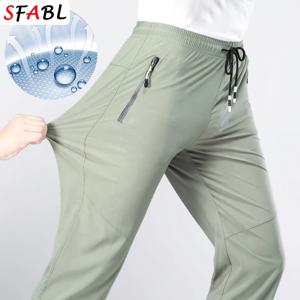5XL 높은 스트레치 야외 스포츠 하이킹 바지 남성 지퍼 포켓 바지 남성 여름 얇은 빠른 건조 남성 바지 트레킹 낚시