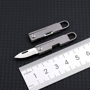 날카로운 접이식 가장자리가 있는 미니 티타늄 합금 포켓 나이프, 휴대용 키체인 펜던트, 언박싱 및 언패킹, 익스프레스 나이프