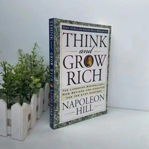나폴레옹 힐의 Think and Grow Rich The Landmark 베스트셀러가 이제 21세기 책으로 개정 및 업데이트되었습니다.