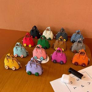 새로운 유행 미니 자동차 바퀴 가방, 쉘 가방 펜던트, 헤드폰 가방, 키체인 가방, 가방 장식품, 동전 지갑.