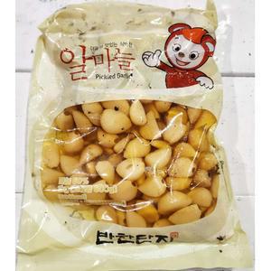 새콤한 깐마늘장아찌 알마늘장아치 통마늘짠지 1kg