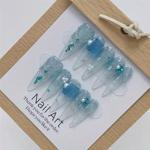TEMU 10pcs 고급스러운 해저 눈물 얼음 플래시 고양이 눈발 스티커 - 긴 팁, 반짝이는 파란색 & 흰색, 광택이 있는 마무리, 고급스러운 매니큐어, 손톱 아트 액세서리 | 반짝이는 손톱 스티커 | 세부적인 손톱 디자인, 손톱 장식|네일팁