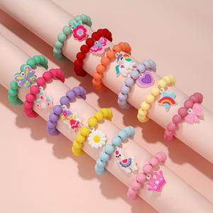 TEMU 12개 나비 알파카 작은 데이지 꽃 별 왕관 리본 유니콘 춤추는 소녀 PVC 펜던트 고무 페인트 비즈 팔찌 세트 휴일 파티 선물 딸을 위한 선물 손자/손녀를 위한 액세서리