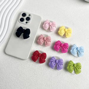 귀여운 다채로운 Bowknot 전화 그립 확장 가능한 데스크탑 스탠드 마카롱 수지 나비 매듭 접이식 홀더 모바일 액세서리
