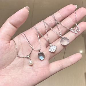 TEMU 5pcs 여성 목걸이 세트, 바다 파란 달석, 진주, 껍질, 나비 펜던트 목걸이, 달콤한, 간단한, 아름다운, 가벼운 고급 목걸이.