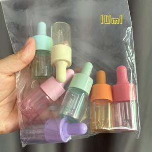 TEMU 7가지 색상 세트 10ml 충전식 미니 드로퍼 병 - 재사용 가능한 유리 및 실리콘 에센셜 오일 용기, 퍼퓸, 및 DIY 공예용, 용기, 유쾌한 디자인, 내구성 있는 구조