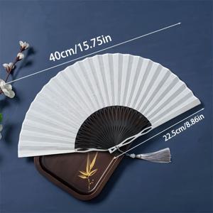TEMU 1개 알루미늄 합금 접이식 부채 - 중국 스타일 크레인 & 구름 디자인, 청록색 & 화이트 전통 예술 휴대용 핸드헬드 팬, 한푸 치파오 댄스, 웨딩, 홈 데코 - 우아한 모던 장식 액세서리, 결혼식 소품, 아티스틱 무늬, 정교한 공예, 문화 애호가, 내구성 있는 재질, 댄스 퍼포머