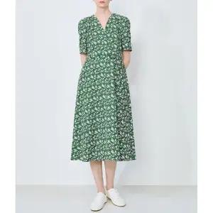 플로럴 백 리본 플레어 원피스 SWWOPO21100