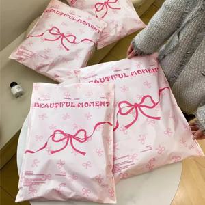 10Pcs 활 매듭과 심장 디자인 포장 가방 방수 물류 의류 우편 주머니 사용자 정의 플라스틱 배송 메일 링 가방