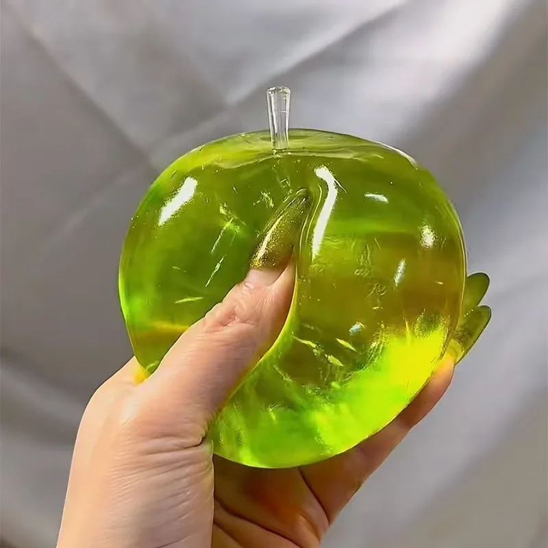 녹색 사과 스퀴즈 장난감은 스트레스를 완화하고 분노를 터뜨립니다. Fidget Toys 플라스틱 스퀴즈 장난감은 친구들을 위한 스트레스를 완화합니다.