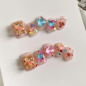 TEMU 텐팩 도파민 아이스 투명 컬러풀 베어 스타 귀여운 캔디 순수 수제 착용 가능한 네일, 아이스 투명 라인스톤 시크 사계절 스타일, Y2K 매니큐어 스티커, 일상 생활 및 생일 파티, 댄스에 적합|매니큐어|네일스티커