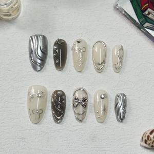 TEMU 10pcs Press-On 풀 커버 네일 세트 - 흰색 및 은색, 물방울 , 3D , 보우넥, 인공 진주, 라인스톤 및 스타라이트 디자인으로 우아한 일상 스타일, 네일 액세서리, 세련된 매니큐어, 장식적인 네일 아트, 광택 있는 핏 네일
