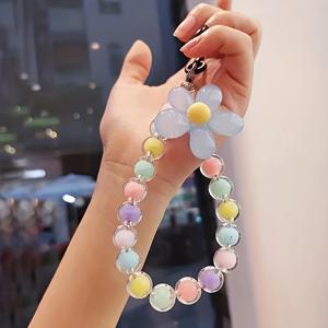 TEMU 새로운, 튼튼하고 휴대용으로 사용할 수 있는 맥아론 색상의 손수 짠 비즈 꽃이 있는 손실 방지 란약. 휴대 전화 체인에는 손목 줄과 컬러풀한 비즈가 있는 손가락 디자인이 포함되어 있습니다. 창의적인 사용자를 위한 완벽한 제품입니다.