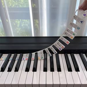 TEMU 초보자를 위한 재사용 가능한 실리콘 무지개색 피아노 키보드 노트 라벨 1개, 61키 보드에 적합한 화이트 라벨 & 블랙 바운드러 - 음악 애호가를 위한 완벽한 크리스마스 & 추수감사절 선물, 피아노 액세서리, 필기체 스타일의 쉬운 읽기 타이포그래피