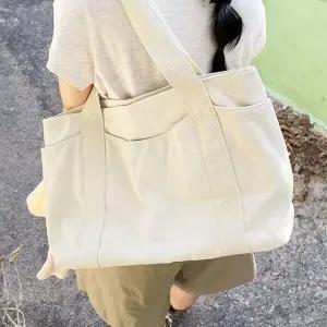 여성 베이지 숄더백 캔버스 가벼운 버킷백 에코