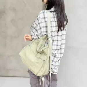 [다잇템] 여성 캐쥬얼 스트랩 경량 자크 바스락 어깨 백팩