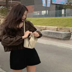 벨리안 체크 프릴 블라우스