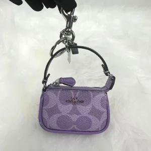 코치 미니 놀리타 백 참 인 시그니처 캔버스 아이리스 퍼플 CX067 NWT 727017