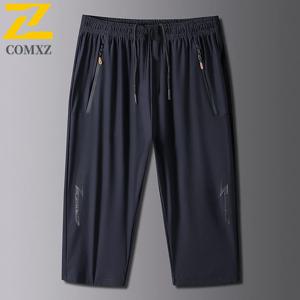 2025 여름 캐주얼 반바지 남성 8xl 사이즈 캐주얼 아이스 실크 스트레치 편안한 카프리 바지 남성 체육관 조깅 Drawstring 스웨트 팬츠