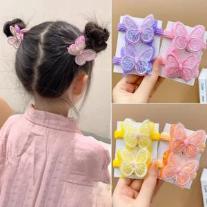 2PCS 새로운 스팽글 나비 소녀 넥타이 포니 테일 어린이 탄성 헤어 밴드 헤어 액세서리 귀여운 어린이 헤어 넥타이 아기 모자를 쓰고 있죠