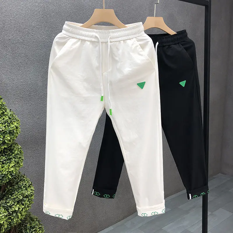 봄과 가을을 위한 고급 남성 캐주얼 바지 여름 화이트 남성을 위한 인기 인터넷 연예인과 멋진 크롭 팬츠