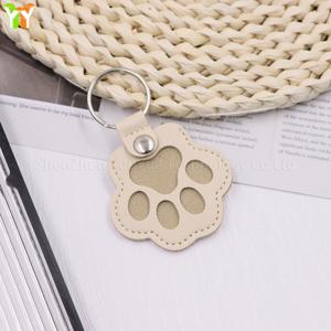 1PC 가죽 애완 동물 머리 보관 가방, 고양이 발 키 체인, 다기능 휴대용 키 체인, 절묘한 가방 펜던트