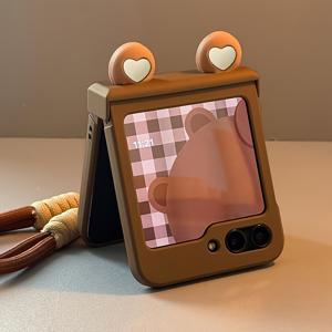 TEMU 삼성 갤럭시 Z 플립 시리즈, Flip 3, 4, 5, 6 포함, 귀여운 갈색 매트 베어 이어 브래킷 보호 케이스, 매력적인 디자인과 나일론 레인드 로프로 낙하 방지 및 내구성 있는 PC 하드 백 커버를 특징으로 합니다.