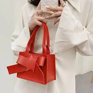 크로스리본 미니토트백 데이트 패션 코디 파티 손가방 (WFI4Y9Y)