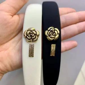 샤샤 까멜리아 금장 헤어밴드 명품 머리띠