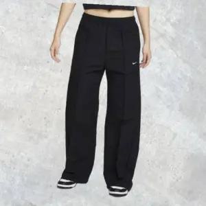 매장정품 나이키 NIKE 스포츠웨어 에브리씽 우븐 여성 미드라이즈 오픈 헴 팬츠 FQ3589-010 155500