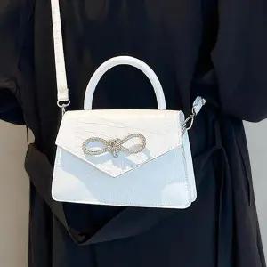 여성 큐빅 리본 장식 스퀘어 미니 크로스백