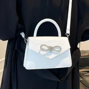 [다잇템] 여성 리본 큐빅 귀여운 스퀘어 사각 크로스 미니백