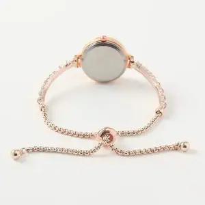 [골드스마일]스톤 장식 슬라이드 여성 손목시계 핑크