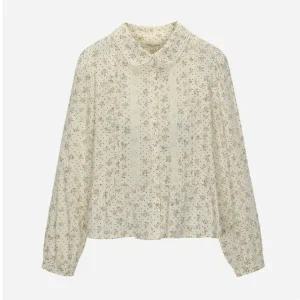 [써스데이아일랜드](T256MBL163W)플라워패턴 페플럼 블라우스