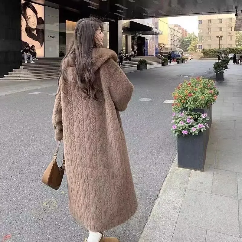 ﻿   2025 겨울 새로운 두꺼운 여성의 긴 모조 밍크 플러시 카디건 통합 모피 친환경 후드 모피 코트 솔리드 컬러