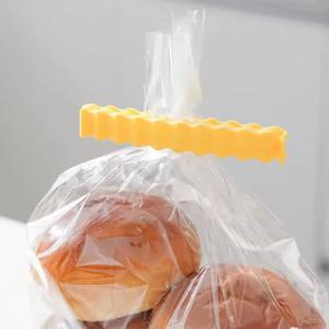 12PCS 감자 모양의 휴대용 주방 스토리지 음식 스낵 인감 가방 클립 실러 클램프 ABS 자기 도구 냉장고 자석