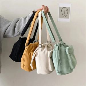 2025 새로운 여성 가방 중간 어깨 가방 한국 스타일 Drawstring 버킷 가방 캐주얼 라이트 청소년 Crossbody 가방 전체 판매
