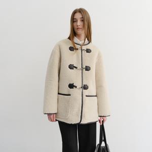 던스트 COLLARLESS BUCKLED SHEARLING JACKET CREAM_UDJU5D223CR