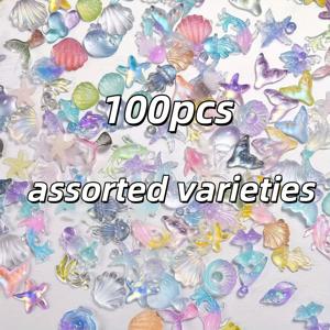 TEMU 50/100개 투명한 바다의 매력적인 세트 - 작은 반짝이는 별고둥과 머메이드의 꼬리, 네일 아트, 폰 케이스, DIY 보석 만들기용 레진 비즈 컬렉션입니다.