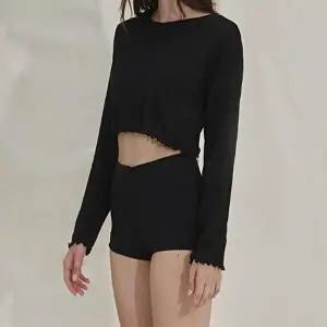 가볍고 부드러운 소재 필라폴 셔링포인트 긴팔 크롭티-WFH4V8E