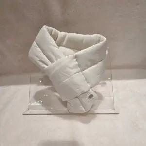 [롯데백화점]타티네쇼콜라 뉴엘패딩머플러 TTNWMF011-T