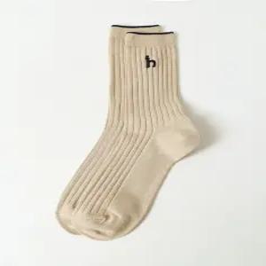헤지스 남성 25SS 베이지 솔리드 장목 양말 HZSS5E103I2