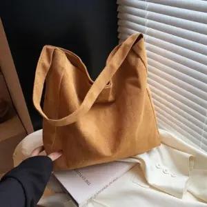 [다잇템] 여성 세무 빅 민무늬 클래식 숄더백